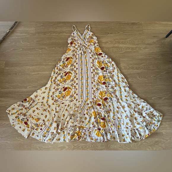 WAYAN Sleeveless Ruffled Floral Dress with Tie Front - Picture 2 of 9